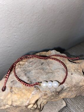 3 Freshwater Pearls on Brown Cord